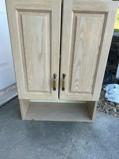 Refresh your space with this charming Oak Bathroom Cabinet! Featuring a double-door design and an op...