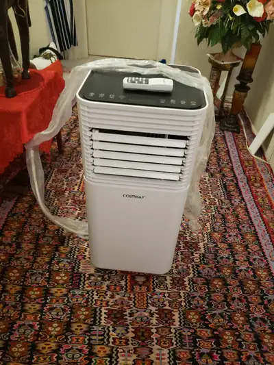 White Costway Portable Air Conditioner in new condition. 10,000 BTU Ac Unit spaces up to 230 sq.ft,...