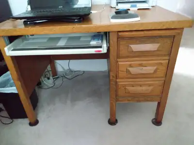 Solid oak desk with slide out computer tray, View more