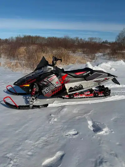 2014 Switchback Assault, 144” x2”, can, new top end, electric start, new battery, 4100 miles.