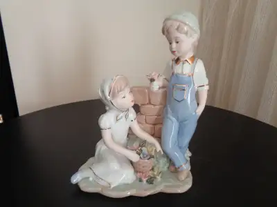 Porcelain figurine - girl and boy, View more