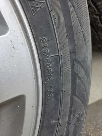 I'm selling a set of winter tires mounted on rims, size 235/60R16. These tires have been previously...