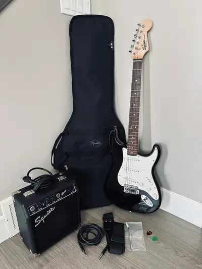 High Quality like new Electric Guitar by Fender with amp, View more