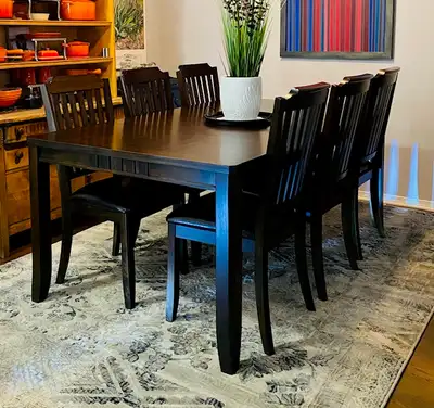 Minden 7-piece dining table set - solid and heavy classic looking design; the leaf works well (18 ")...