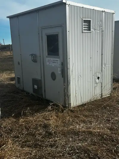 I'm selling an oil field shack with dimensions suitable for various applications, as seen in the pho...