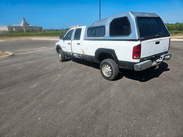 **Dodge Ram 2500 5.9 diesel 4x4 long box crew cab topper in Cars & Trucks in St. Catharines - Image 2
