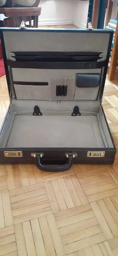 Brown leather briefcase with Secure combination lock Multiple interior compartments Good condition M...