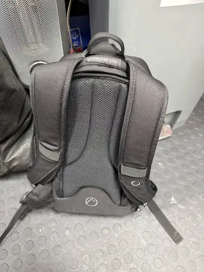This Lowepro Flipside 200 camera backpack is a compact and secure way to carry your camera gear. It'...