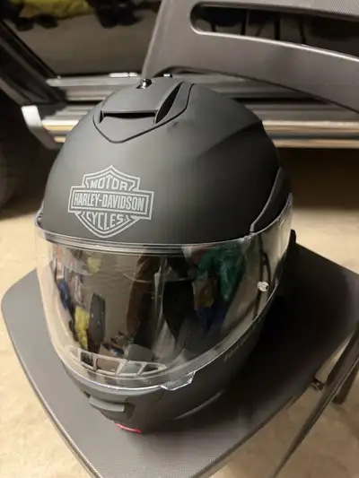 I am selling a brand new Harley-Davidson helmet, a sleek and safe choice for any motorcycle rider, f...