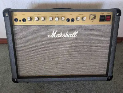 1995 2 Channel, 2 speaker amp that gets plenty loud if required. Comes with foot switch. In very goo...