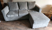 Like new couch with reversible chaise 