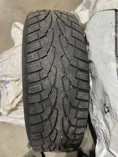 Set of 4 Uniroyal Tiger Paw Snow and Ice - 225/65R17 Used 4 seasons, lots of tread left. Steel rims...