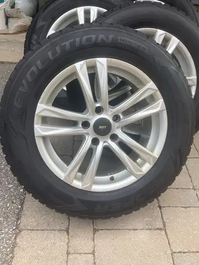 Used Cooper Evolution Winter tires and BST aluminum rims from a 2015 Chevrolet Equinox. Used for a c...