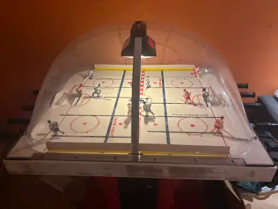 The original super Chex bubble hockey. Not played much. Being sold as is (stickers are peeled off an...