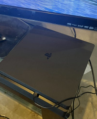 PS4 Slim 1Tb  4 controllers and lots of games