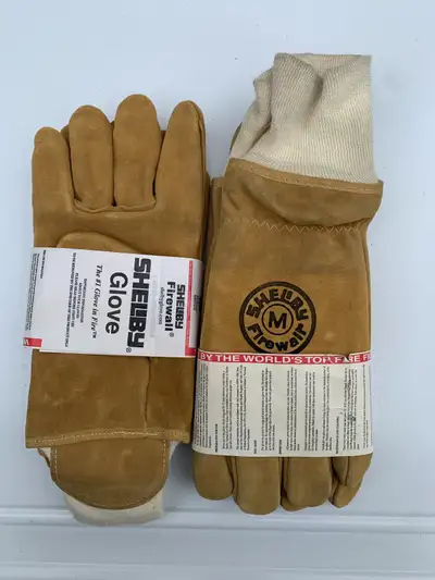Brand new never been used safety gloves for firefighters by Shelby. First responder safety gear, han...