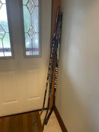 3 hockey sticks