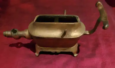ANTIQUE CURLING IRON HEATER, View more