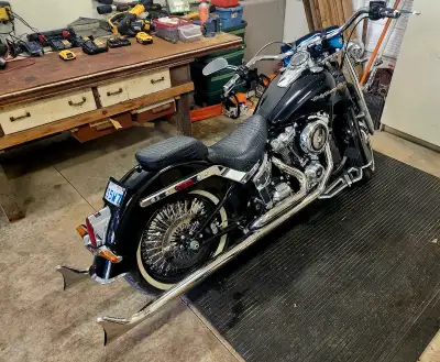 Feast your eyes on this striking Harley-Davidson Deluxe, boasting a classic black finish and distinc...