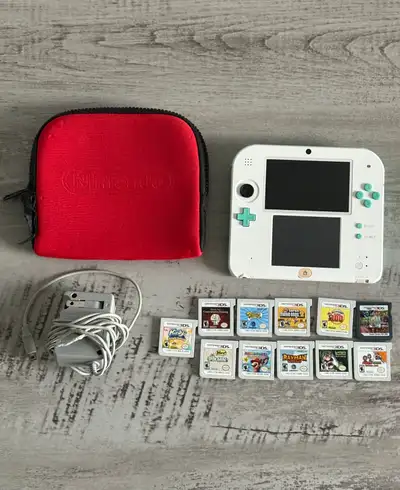 I'm selling a pre-owned Nintendo 2DS in new condition ,perfect for gaming on the go, accompanied by...