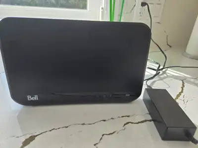Fully functional Bell 3000 Modem/Router with power adaptor.