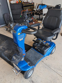 Blue scooter for disability