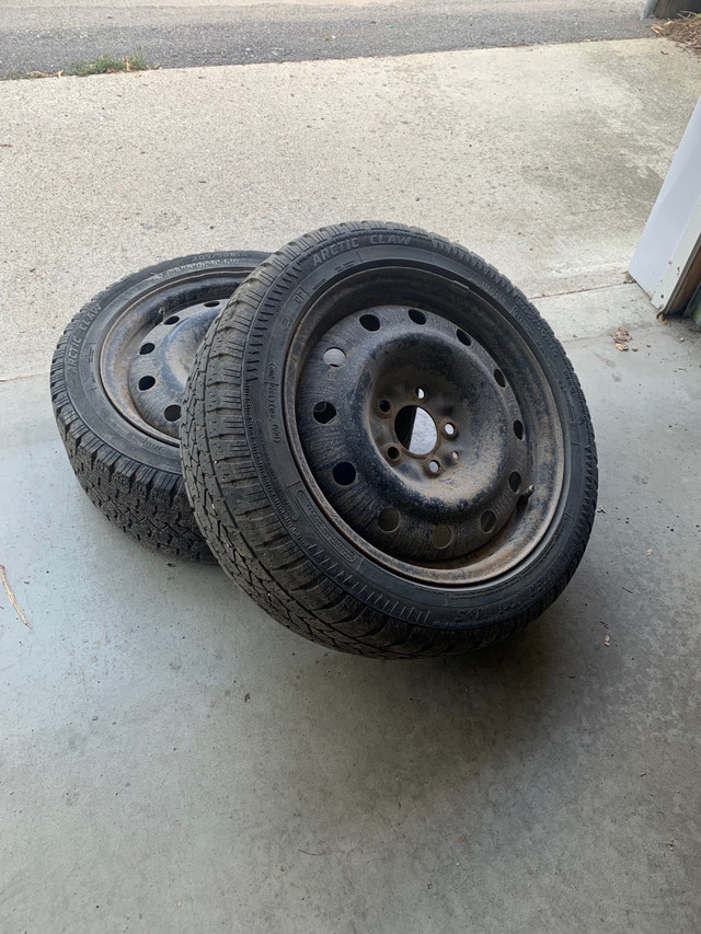 Two Artic Claw winter tires in Tires & Rims in Regina