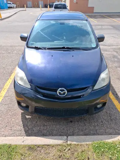 I'm selling my 2006 Mazda5, a practical and versatile minivan with 267212 kilometers on the odometer...