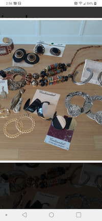 Costume jewelry. Earrings, brooches, necklace. Many new.