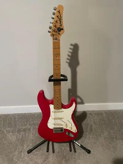 1992 Washburn WE1-R Electric 6 string Guitar. Lightly Used, Includes Floor Stand. Recommend string r...
