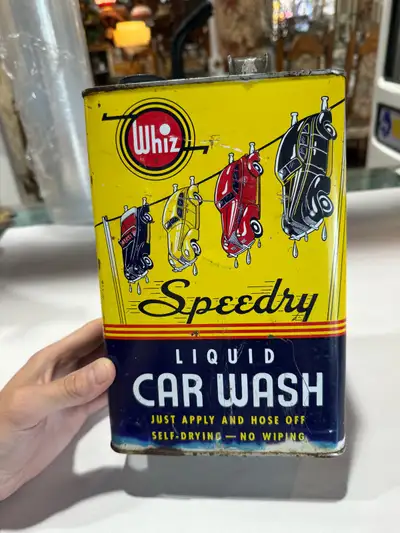 early Whiz tin with car graphics , View more