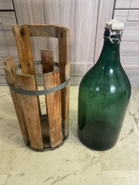Vintage Demijohn Bottle with Wooden Basket $75