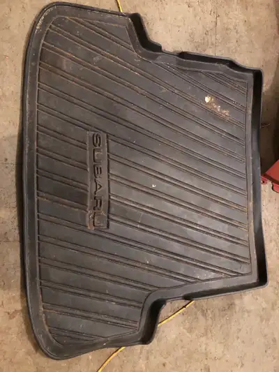 2 Rear Cargo Liners for Subaru Outbacks. Good Condition.Photos to follow.