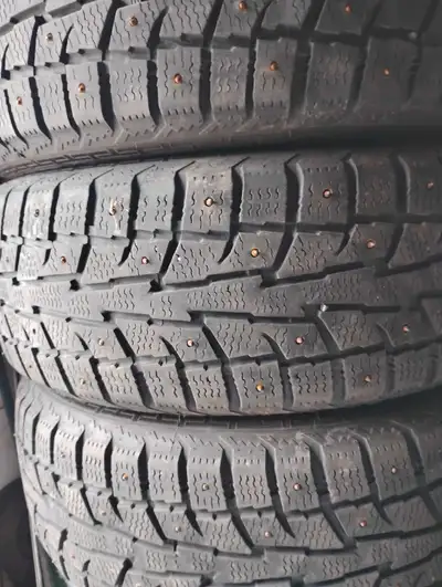 4 studded tires on steel rims came off a Ford Edge 245/60R/18 in great shape posting for a friend so...