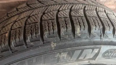 used like new winter tires and rims 205 65r15. Used very limited for a few years, still lots of trea...
