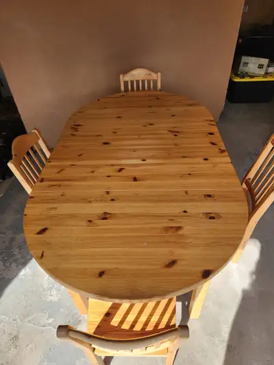 46 inch round rustic pine wood dining table with two removable 16 inch leafs allowing table to be ex...