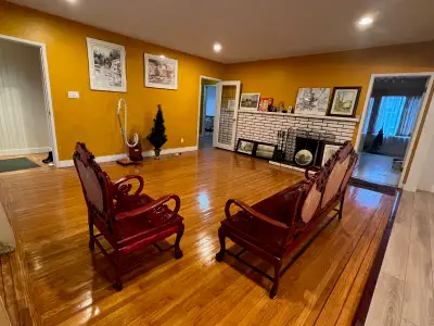 Central well-maintained house on a quiet residential block steps away from Oakridge Canada Line tran...