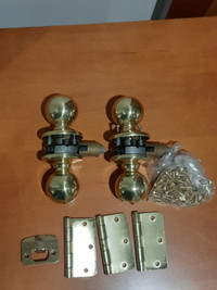 Brass door knobs and hinges, and pocket door latches