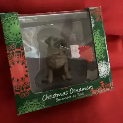 Adorable Pug ornament. Comes with original box. From a smoke free home, can ship at buyers expense.