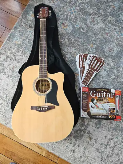 Selling my Washburn acoustic-electric guitar, which is in good condition and ready to play! This gui...