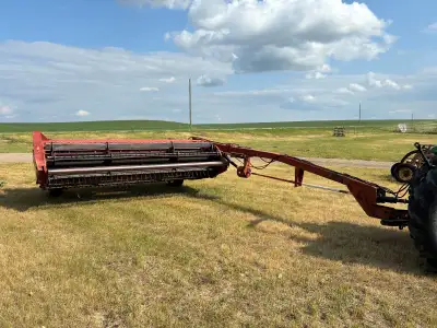Hesston 1150 12' mower conditioner $ 6000, NH 1033 stackliner 104 bale capacity $4500 and I have sol...