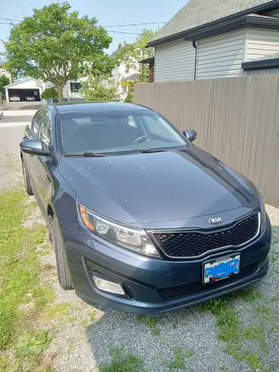 kia optima lx , good condition. no large issues. very reliable car. some small wear on the steering...