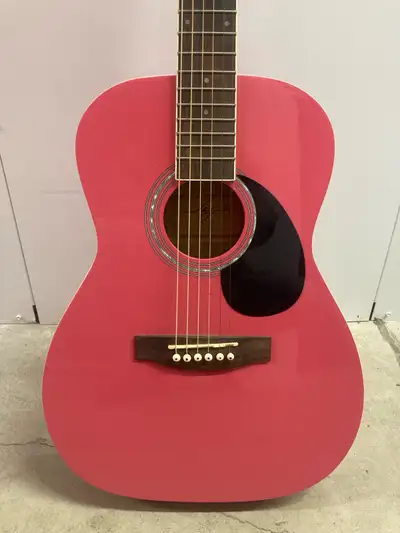 Here’s a gorgeous small bodied guitar made entirely of solid wood construction with a surprisingly g...