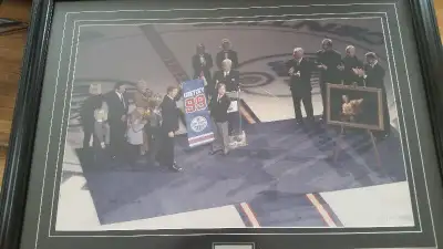 Framed display picture commemorating the night the Oilers retired Wayne's number. 40" X 30" to outsi...
