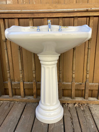 Bathroom white pedestal sink