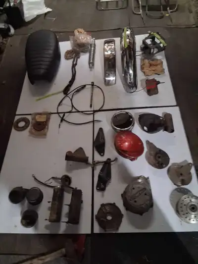 Message with needs. Lots of good motor parts, cases and gears, good front fender, drums, fork ears a...