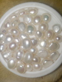 47 Decent Sized, Fresh Water Pearls. 900 OBO. Worth 1000$+