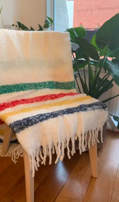 Lightweight wool-blend blanket in classic multistripe. Fringe trim 46% acrylic/40% wool/14% nylon Ha...