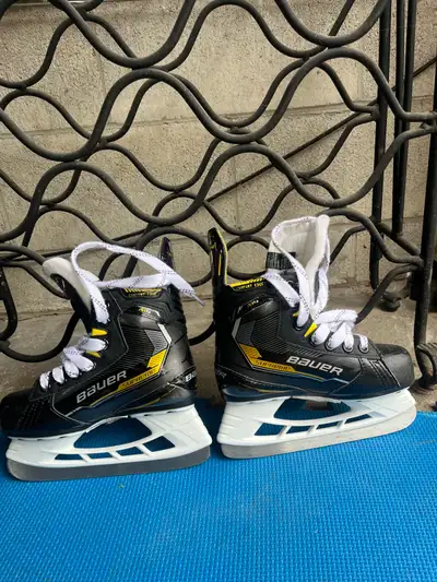 Kids size 12.5 Bauer Supreme Hockey Skates, View more
