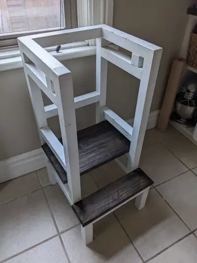Kids kitchen step stool. Works great, the base is height adjustable. We also have a bar that goes ac...